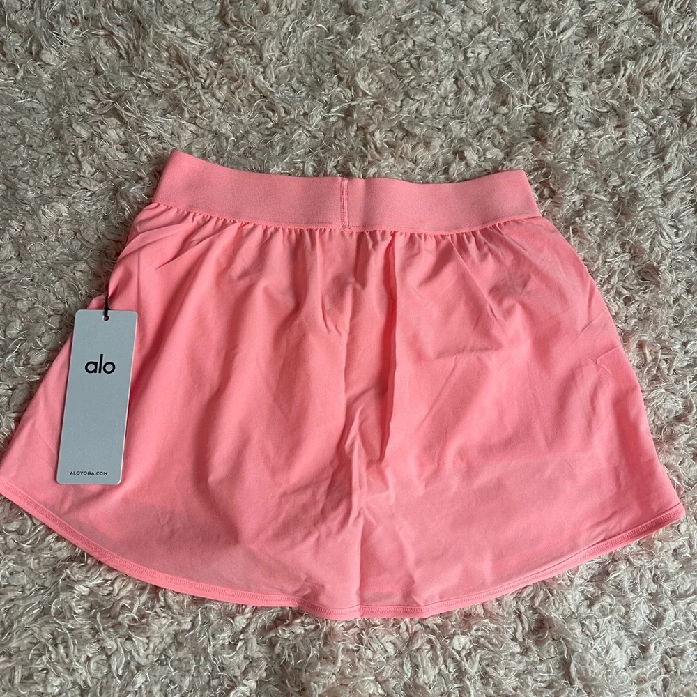 Brand new Alo neon bubblegum skirt size medium